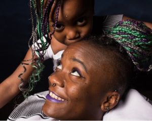 A queer Nigerian mother and their daughter in Essex, UK