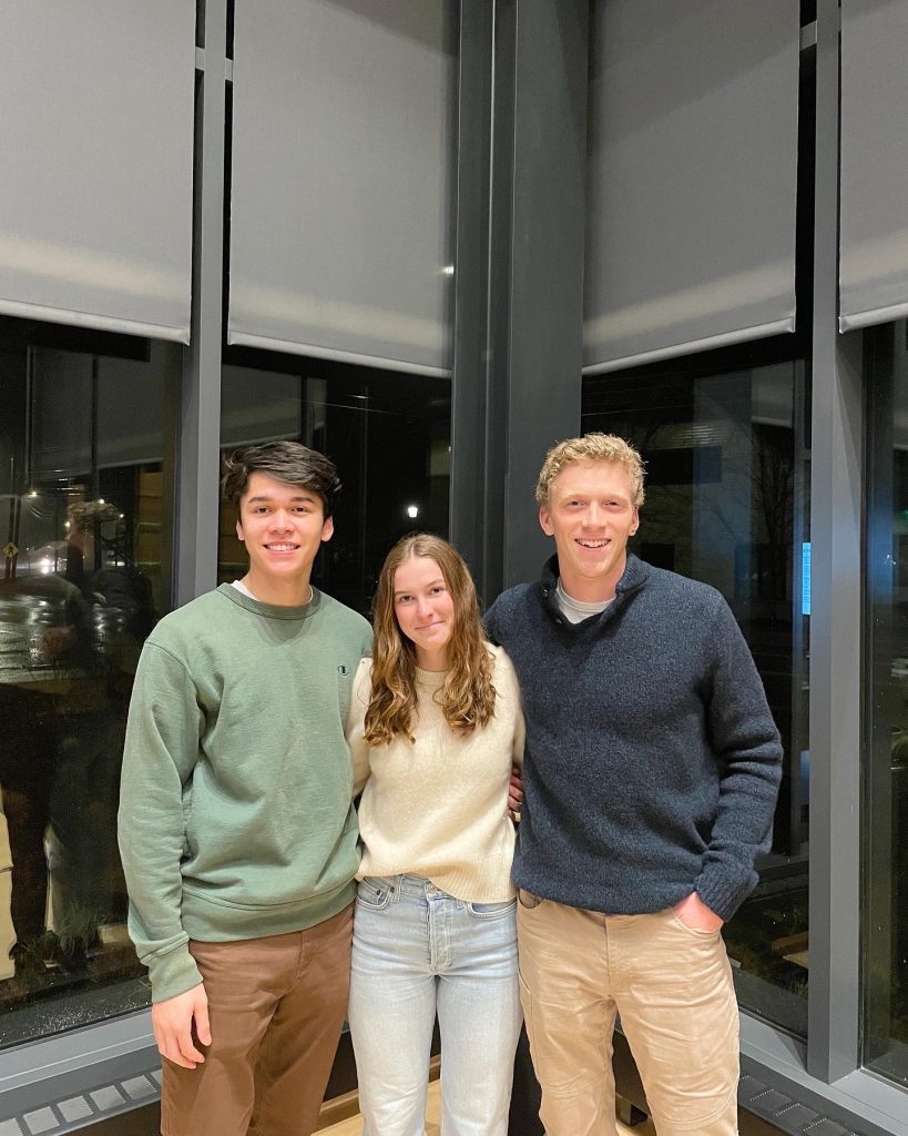 Photo of three student leaders of the project in the Roux Center