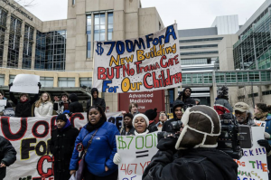 Rally demanding care in front of the University of Chicago Medical Center